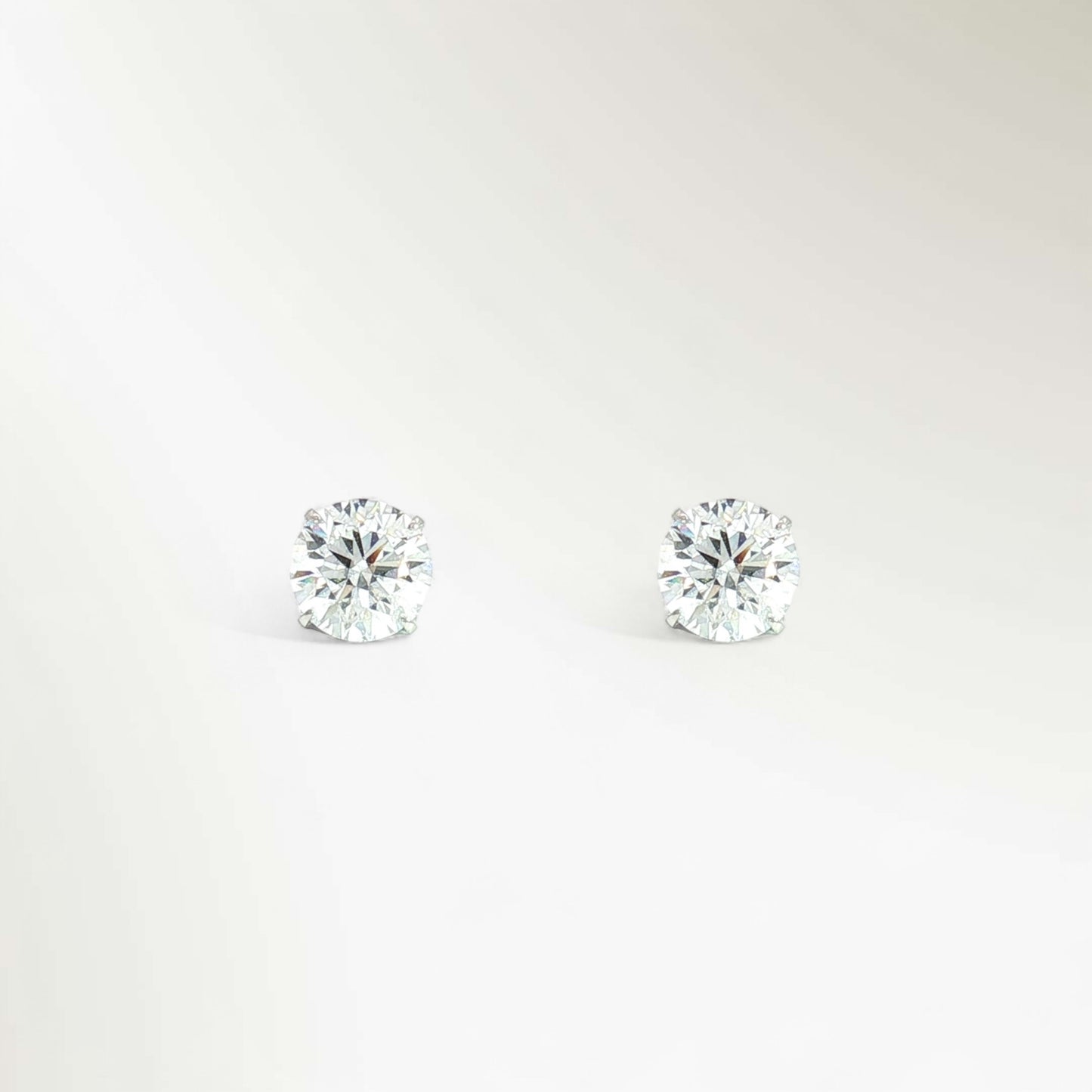 SIRIUS SOLITAIRE PIERCED EARRINGS 0.6ct